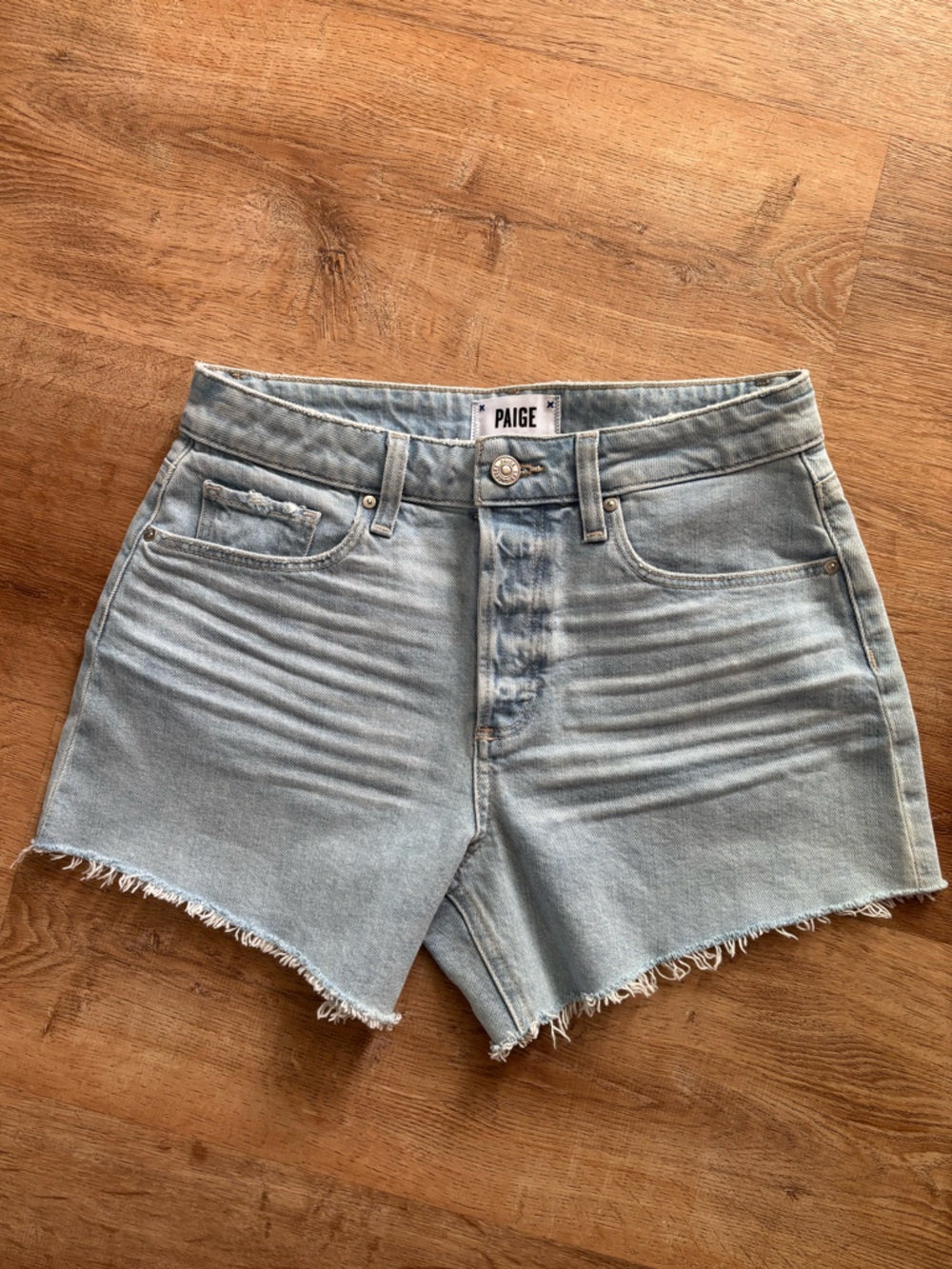 PAIGE/Anthropologie  light denim cut off jean shorts